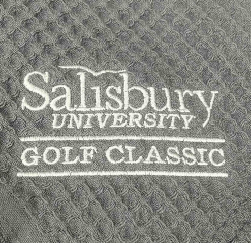 Salisbury University Golf Classic Gray fabric with white embroidered text reading Salisbury University Golf Classic.