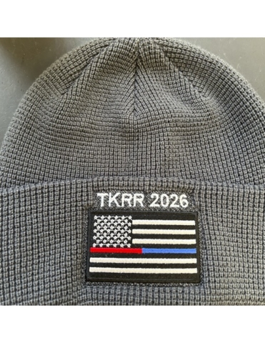 Tim Kennard River Run Gray knit beanie with flag patch and embroidered TKRR 2026 for Tim Kennard River Run.